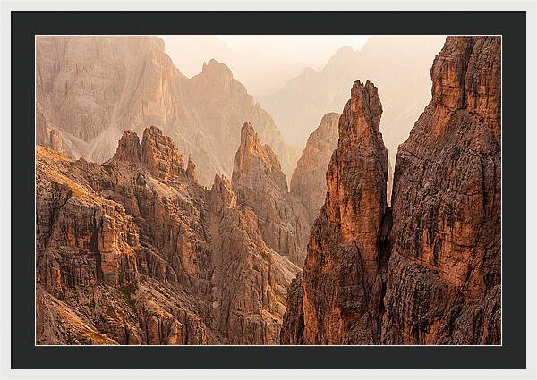 Dolomite Spires Bathed In Golden Light