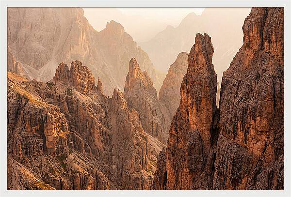 Dolomite Spires Bathed In Golden Light