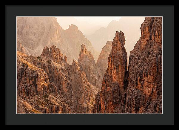 Dolomite Spires Bathed In Golden Light