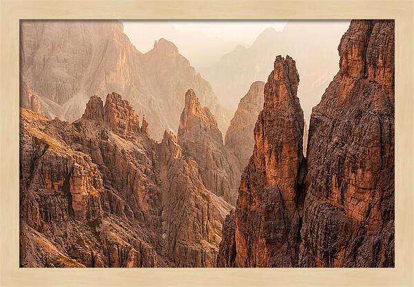 Dolomite Spires Bathed In Golden Light