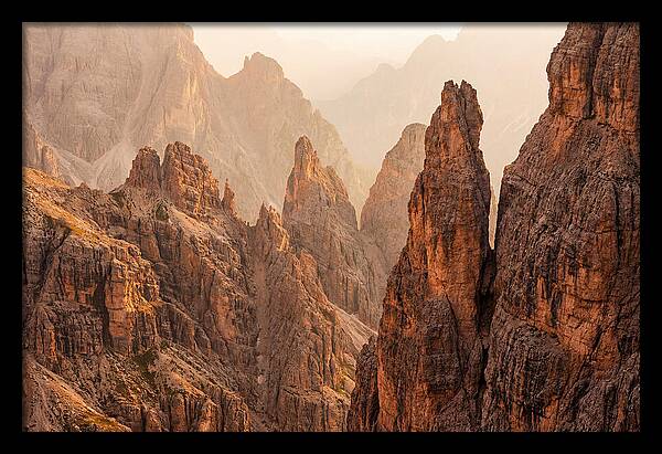 Dolomite Spires Bathed In Golden Light