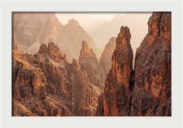 Dolomite Spires Bathed In Golden Light