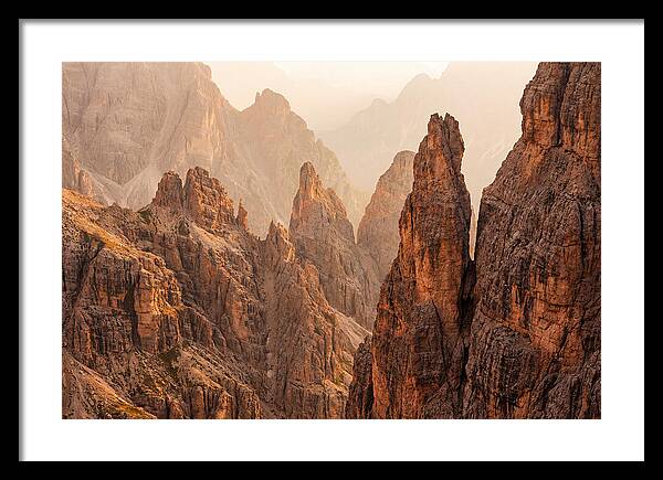 Dolomite Spires Bathed In Golden Light