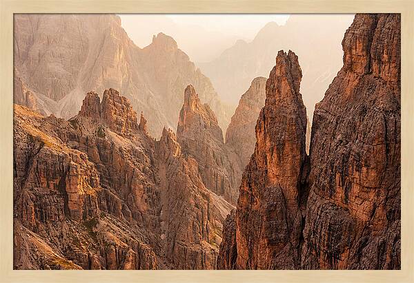 Dolomite Spires Bathed In Golden Light