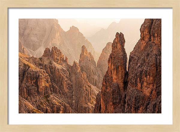 Dolomite Spires Bathed In Golden Light