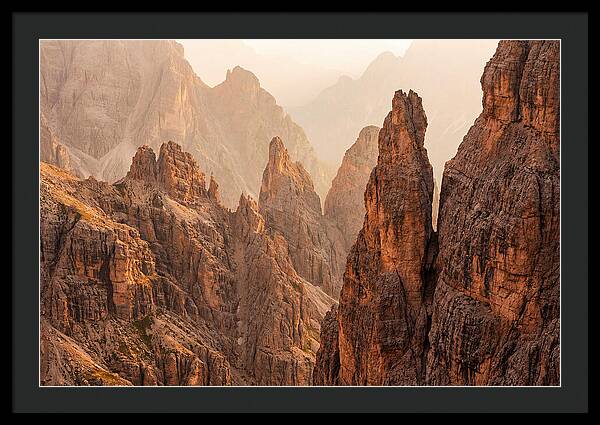 Dolomite Spires Bathed In Golden Light