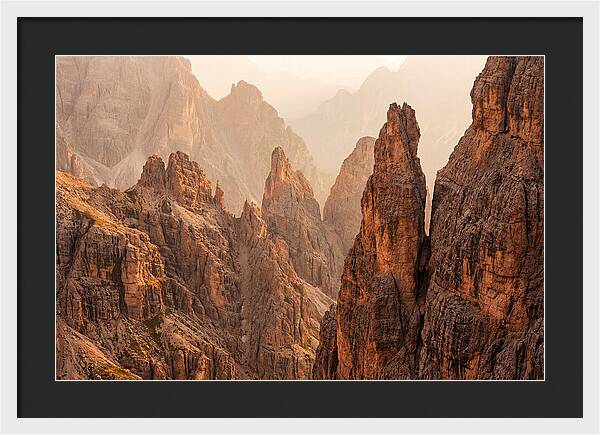 Dolomite Spires Bathed In Golden Light
