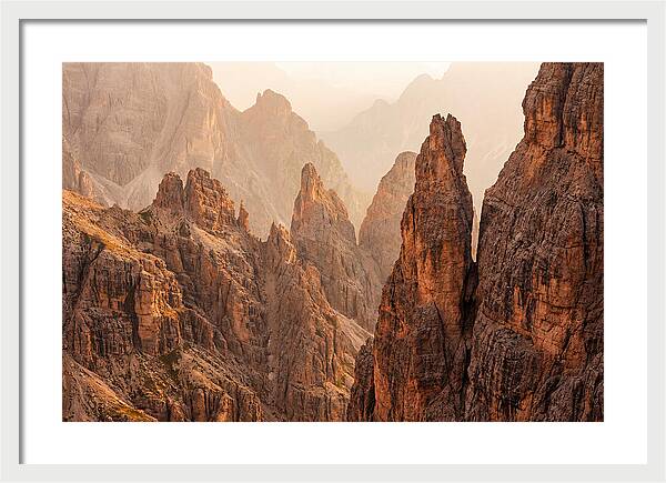 Dolomite Spires Bathed In Golden Light