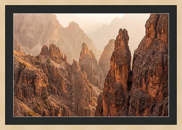 Dolomite Spires Bathed In Golden Light