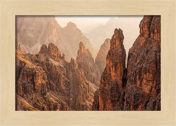 Dolomite Spires Bathed In Golden Light
