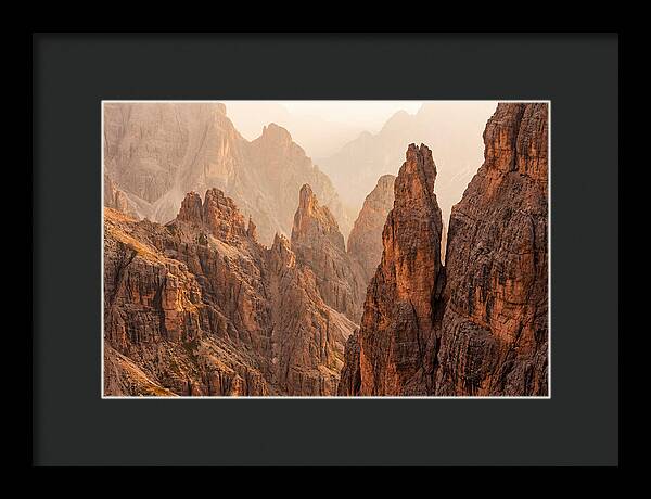 Dolomite Spires Bathed In Golden Light