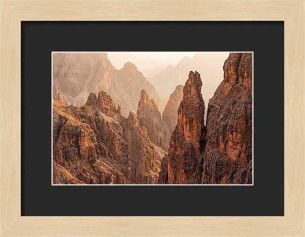 Dolomite Spires Bathed In Golden Light
