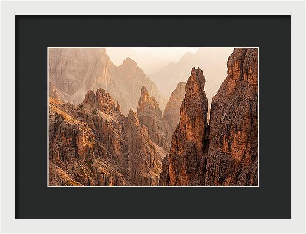 Dolomite Spires Bathed In Golden Light