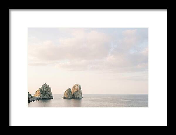Dramatic Dusk Over Faraglioni Stacks