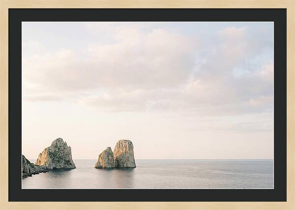 Dramatic Dusk Over Faraglioni Stacks