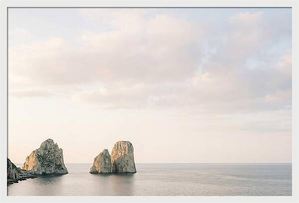 Dramatic Dusk Over Faraglioni Stacks