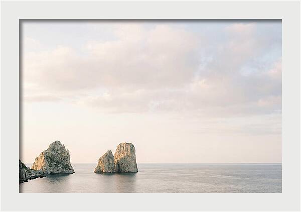 Dramatic Dusk Over Faraglioni Stacks