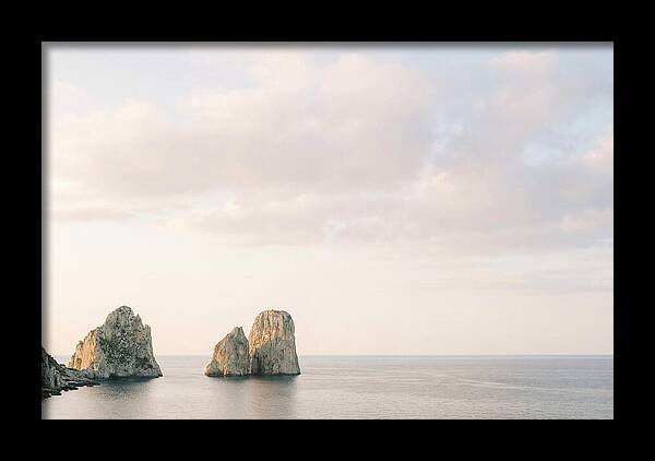 Dramatic Dusk Over Faraglioni Stacks