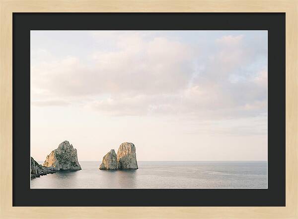Dramatic Dusk Over Faraglioni Stacks