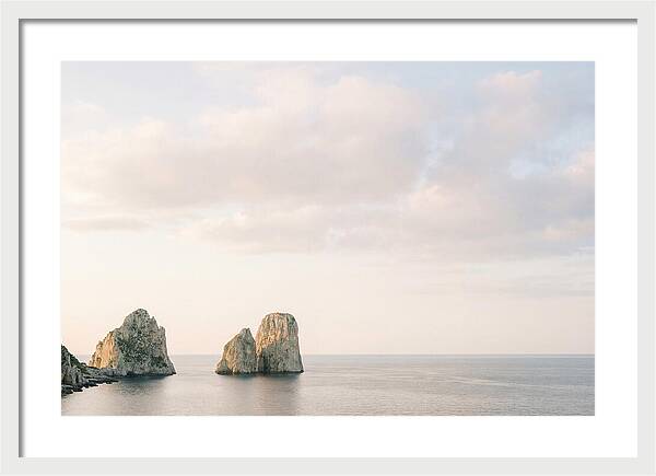 Dramatic Dusk Over Faraglioni Stacks