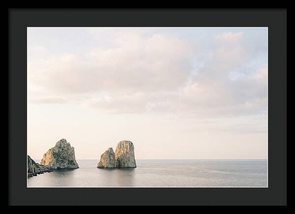 Dramatic Dusk Over Faraglioni Stacks
