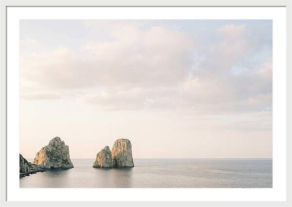 Dramatic Dusk Over Faraglioni Stacks