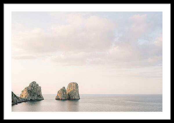 Dramatic Dusk Over Faraglioni Stacks