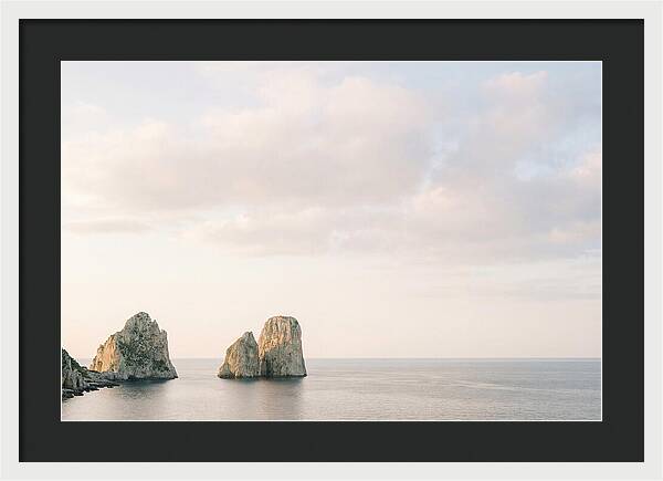 Dramatic Dusk Over Faraglioni Stacks