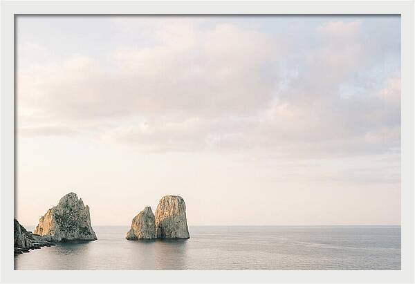 Dramatic Dusk Over Faraglioni Stacks