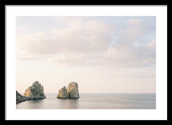 Dramatic Dusk Over Faraglioni Stacks
