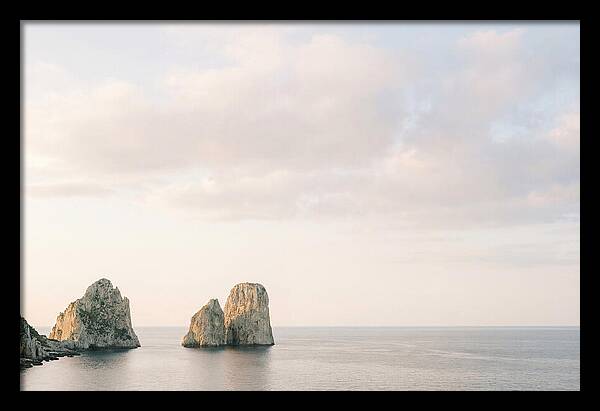 Dramatic Dusk Over Faraglioni Stacks