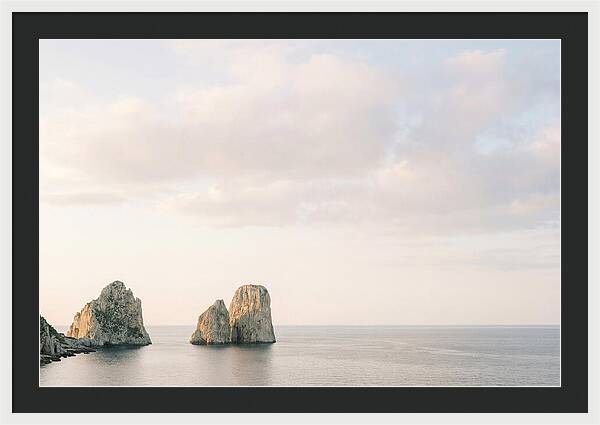 Dramatic Dusk Over Faraglioni Stacks
