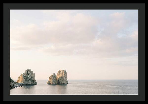 Dramatic Dusk Over Faraglioni Stacks