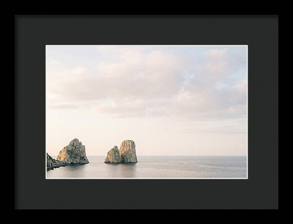Dramatic Dusk Over Faraglioni Stacks