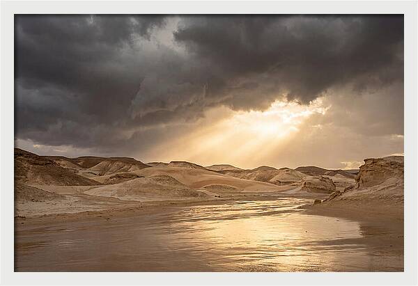 Dramatic Golden Light Through Thunderstorm