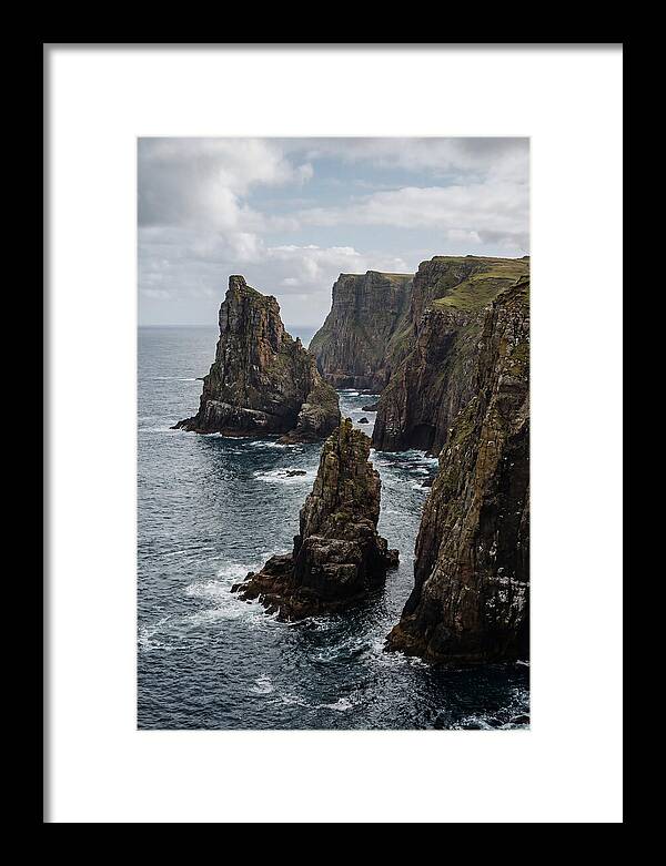 Dramatic Sea Stacks Rising From Water