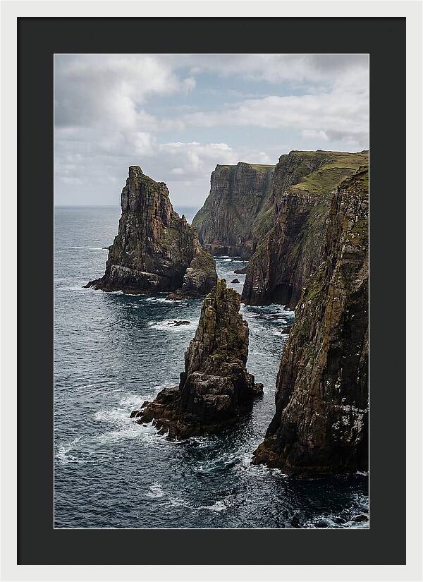 Dramatic Sea Stacks Rising From Water