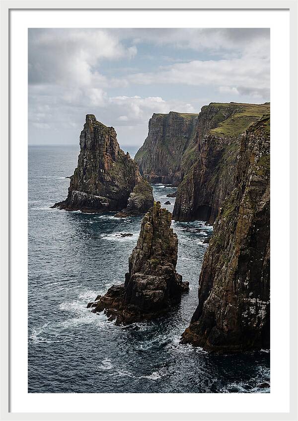Dramatic Sea Stacks Rising From Water