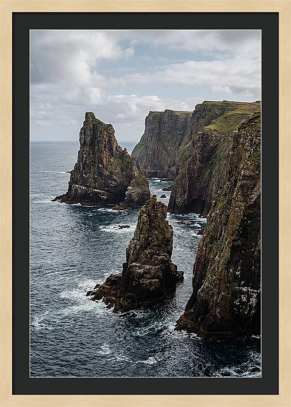 Dramatic Sea Stacks Rising From Water
