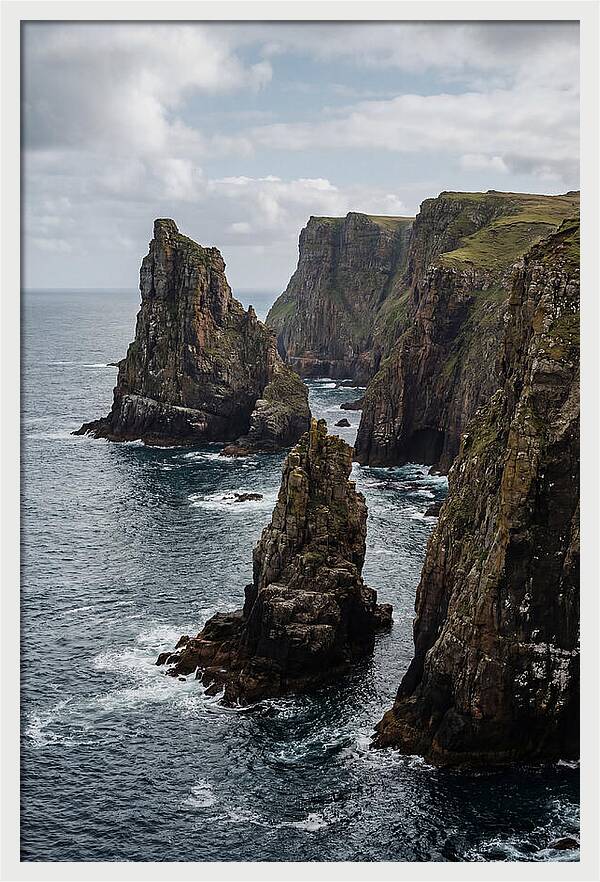 Dramatic Sea Stacks Rising From Water