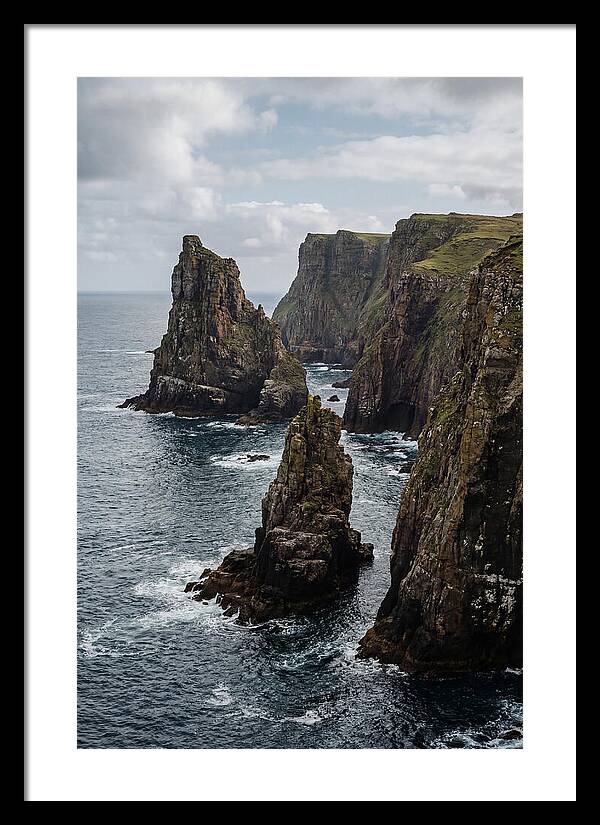 Dramatic Sea Stacks Rising From Water