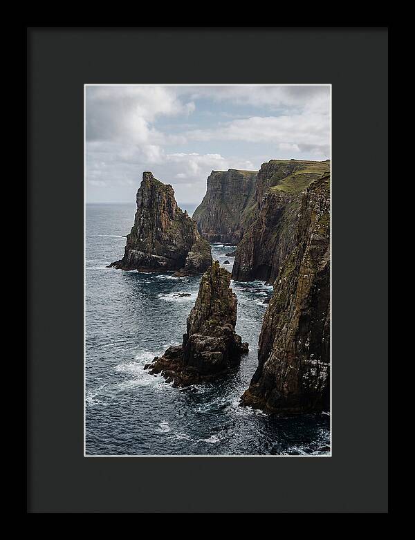 Dramatic Sea Stacks Rising From Water
