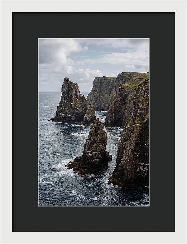 Dramatic Sea Stacks Rising From Water