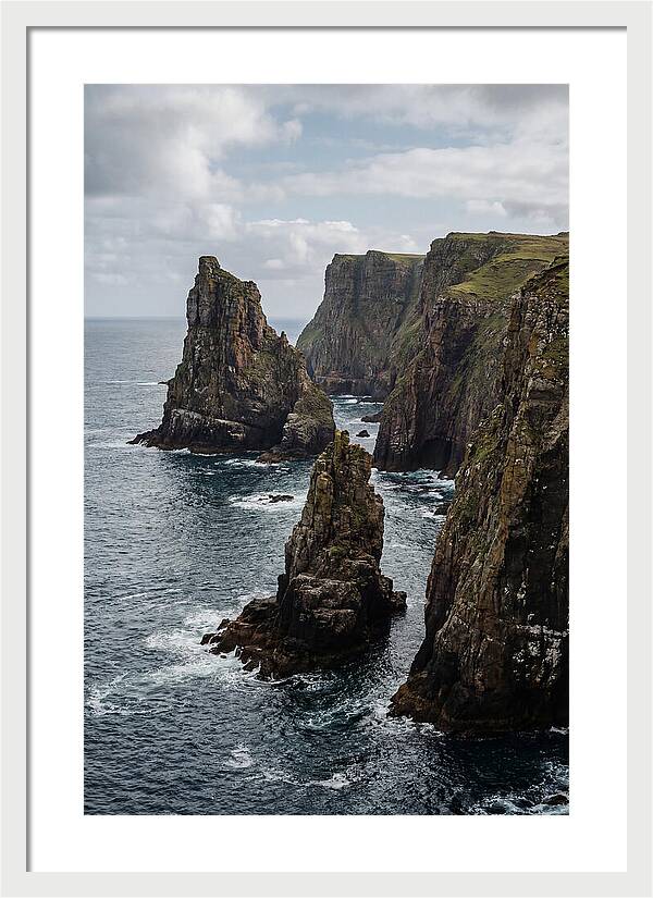 Dramatic Sea Stacks Rising From Water