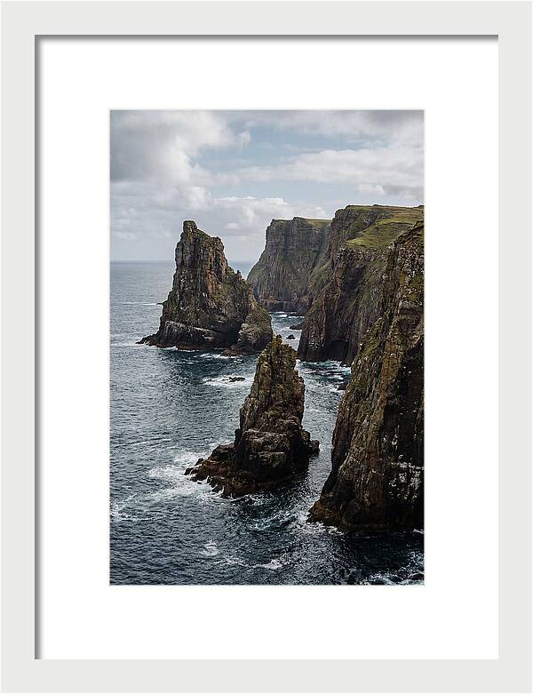 Dramatic Sea Stacks Rising From Water