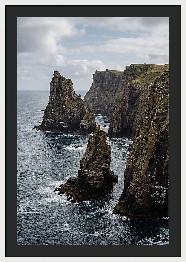 Dramatic Sea Stacks Rising From Water