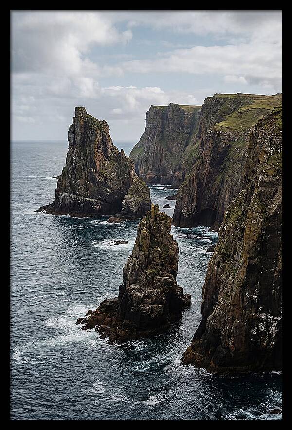 Dramatic Sea Stacks Rising From Water