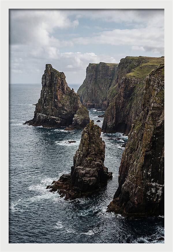 Dramatic Sea Stacks Rising From Water