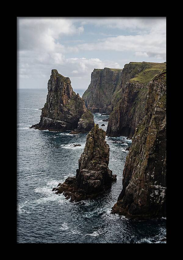 Dramatic Sea Stacks Rising From Water