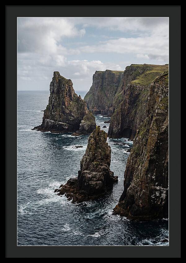 Dramatic Sea Stacks Rising From Water